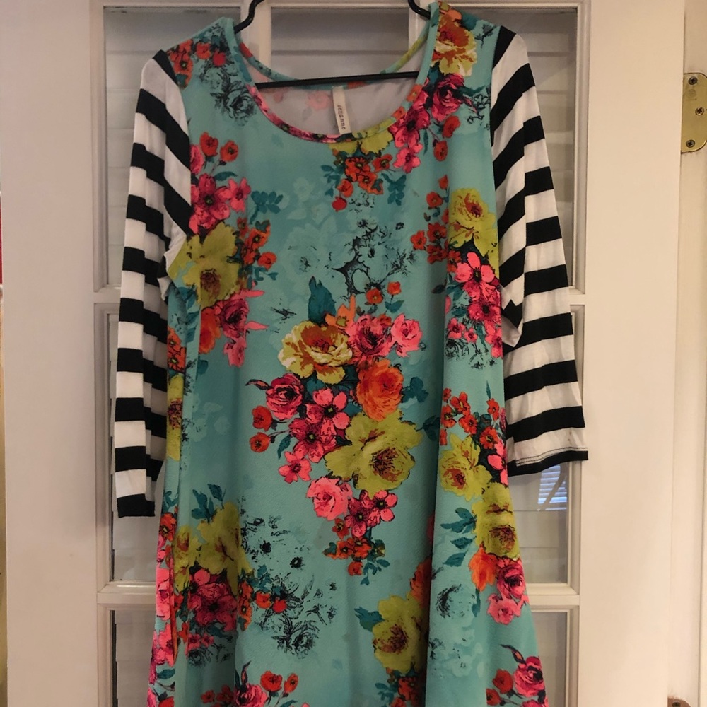 Brightly colored long blouse